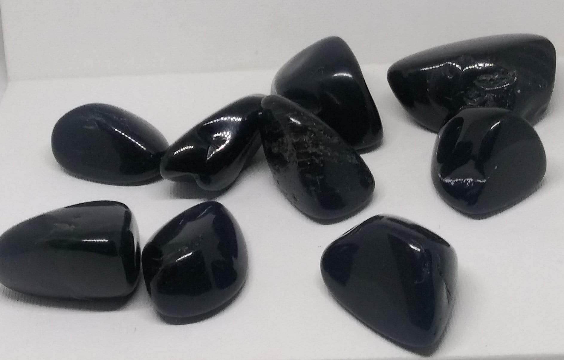 Black Onyx Natural Madagascar Mined tumbled with info card - Guiding Lights Boutique