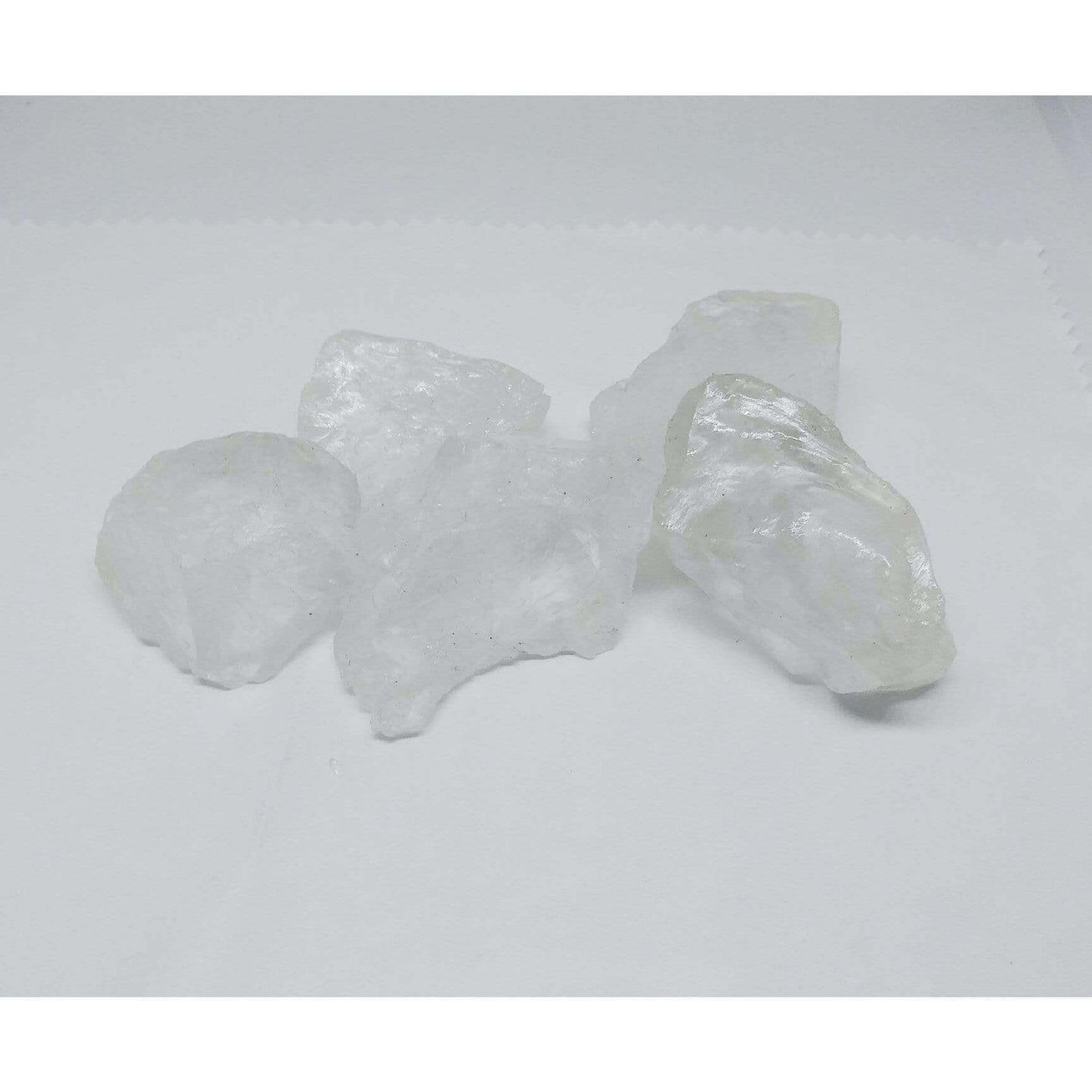 Clear Quartz Natural Raw Rough or Tumbled Spiritual Crystal Chunk Mined in Brazil - Guiding Lights Boutique